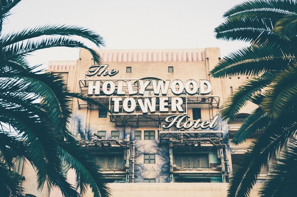 Free Image of Hollywood Tower Hotel Surrounded by Palm Trees 