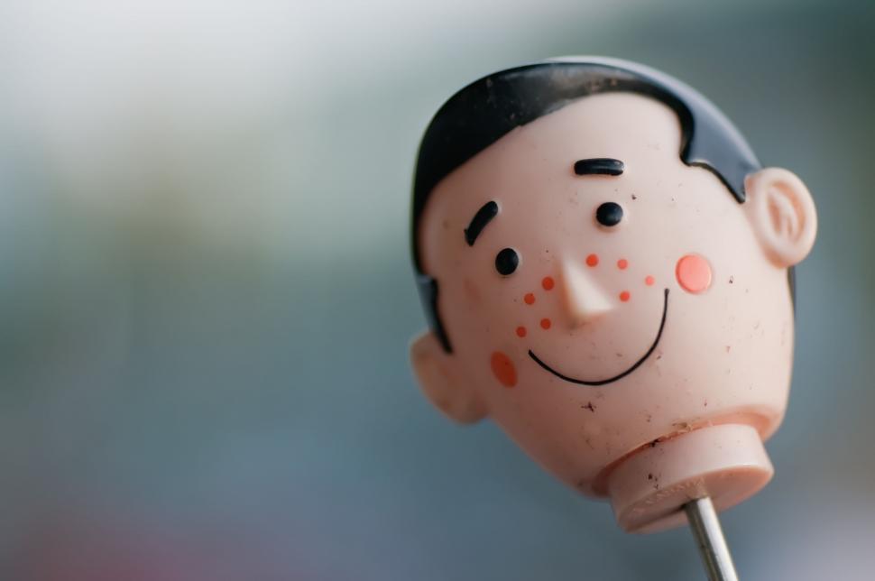 Free Image of Toy Head With Toothpick 