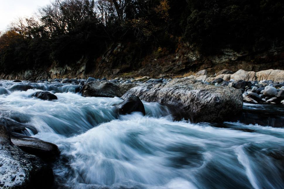 Free Image of River With Rocks Flowing Through 