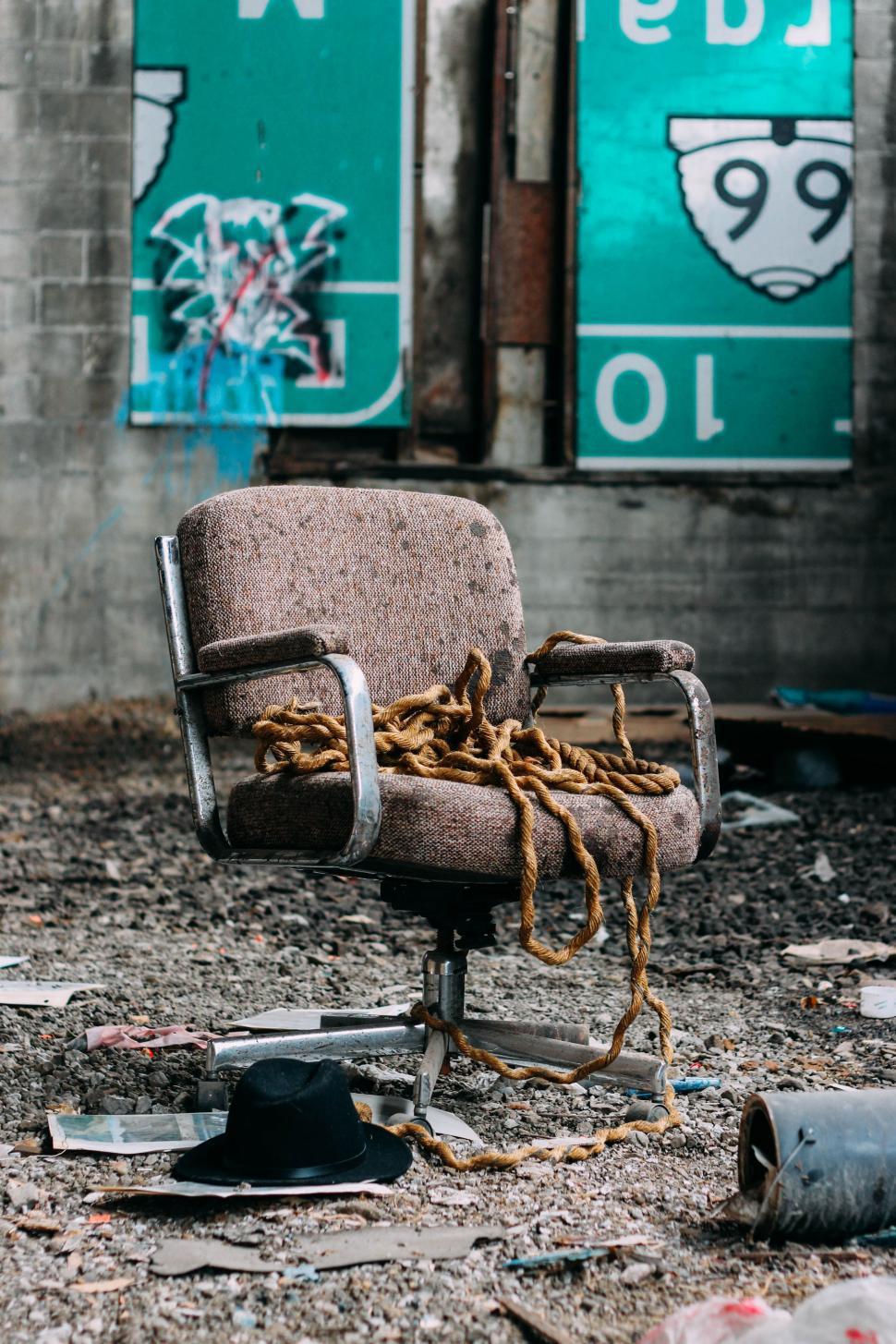 Free Image of Old Chair Outside Building 