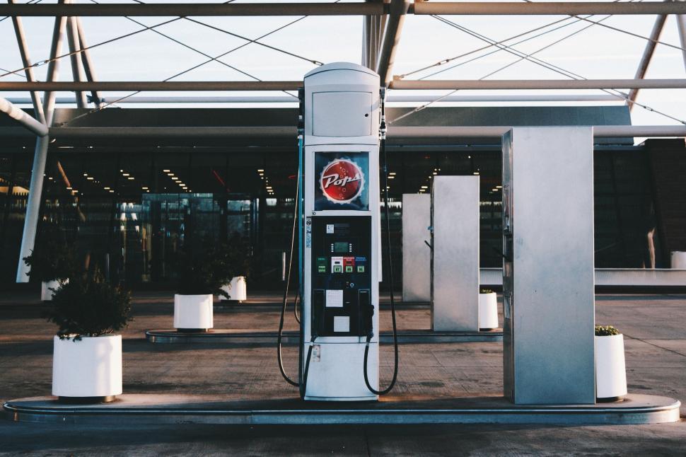 Free Image of Gas Station With Gas Pump in Foreground 