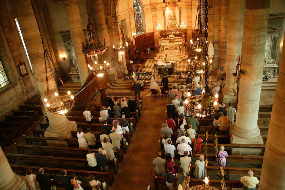 Free Image of Large Group of People Standing in a Church 