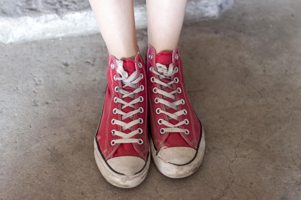 Free Image of Close Up of Persons Feet in Red Sneakers 