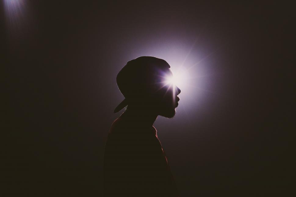 Free Image of Silhouette of a Person in Darkness 