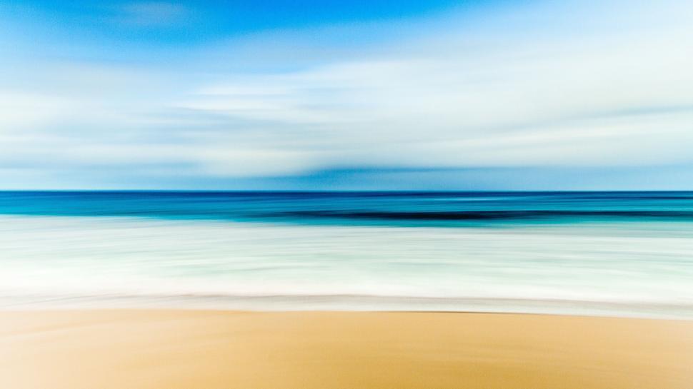 Free Image of Blurry View of Beach and Ocean 