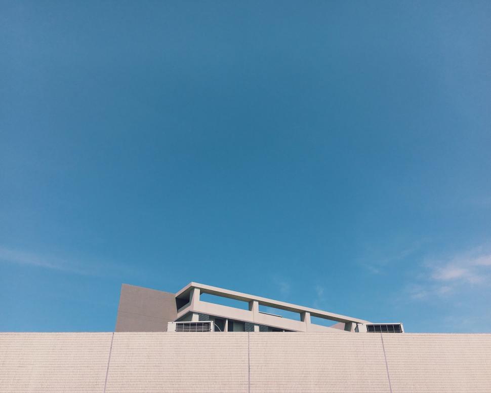 Free Image of White Building Under Blue Sky 
