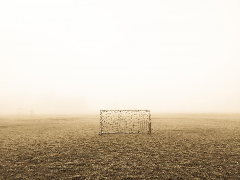 Free Image of Soccer Goal in the Middle of a Foggy Field 