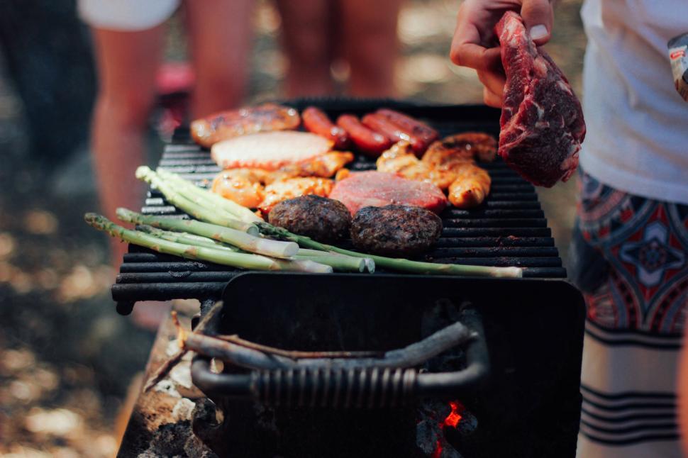 Free Image of Person Grilling Meat and Vegetables on a Grill 
