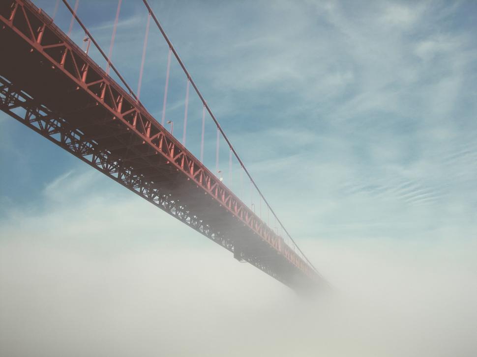 Free Image of Impressive Bridge Towering in the Foggy Sky 