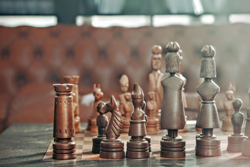 Free Image of Group of Chess Pieces on Table 
