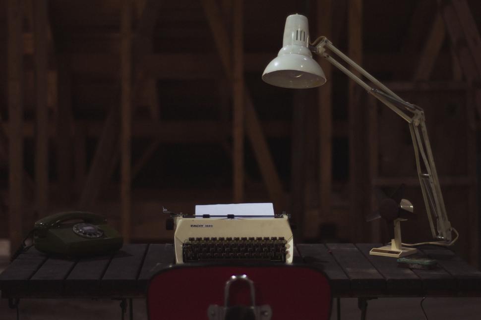 Free Image of Vintage Typewriter and Lamp on Desk 