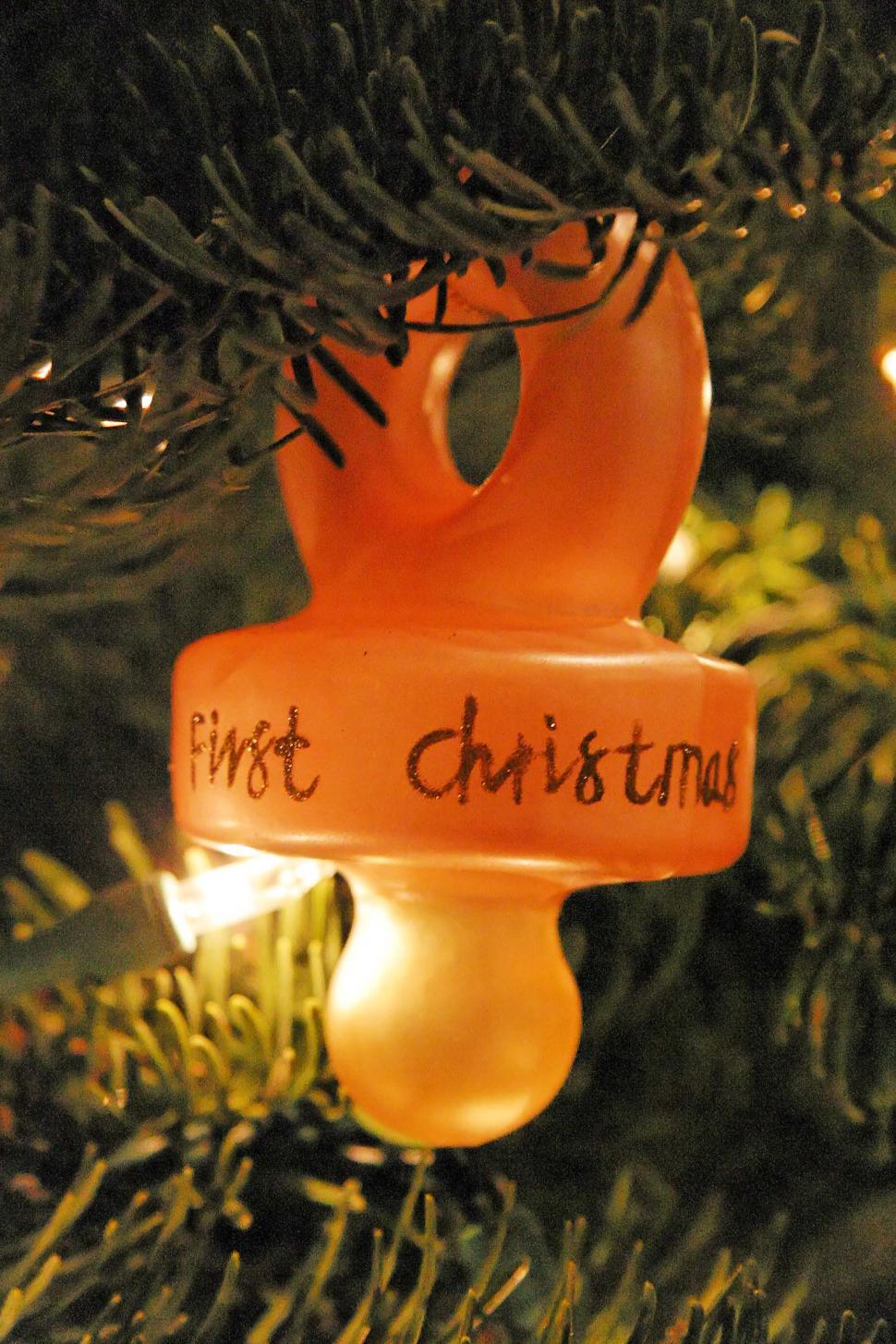 Free Image of christmas holiday ornament holidays decoration glass baby babys first hanging tree pacifier nipple 