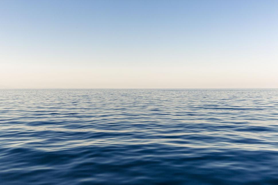 Free Image of Vast Water Body With Sky Background 
