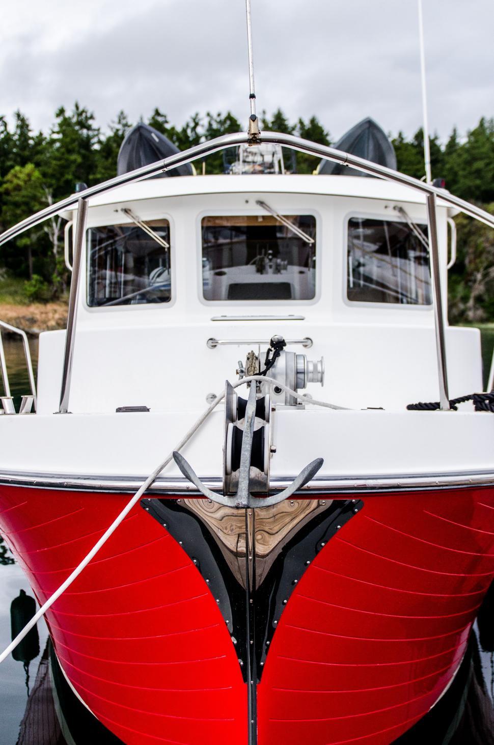 Free Image of Red and White Boat Docked at Dock 