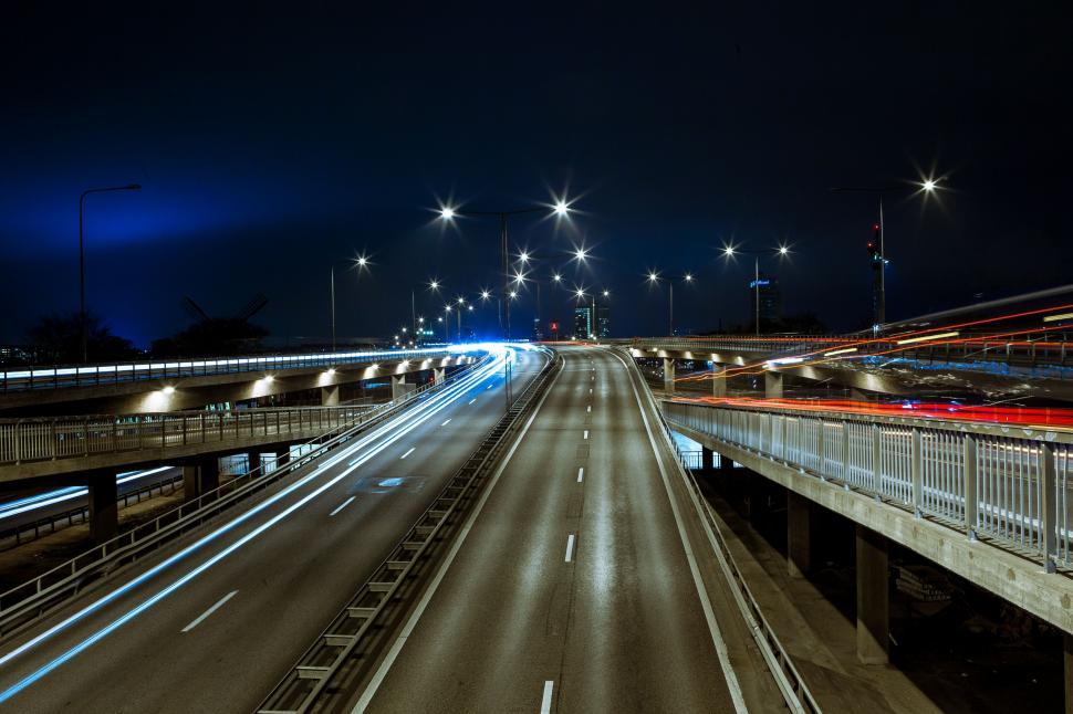 Free Image of Highway Illuminated With Bright Lights at Night 