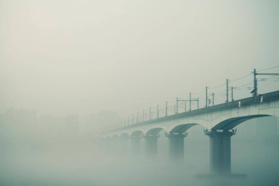 Free Image of Misty Bridge Over River 