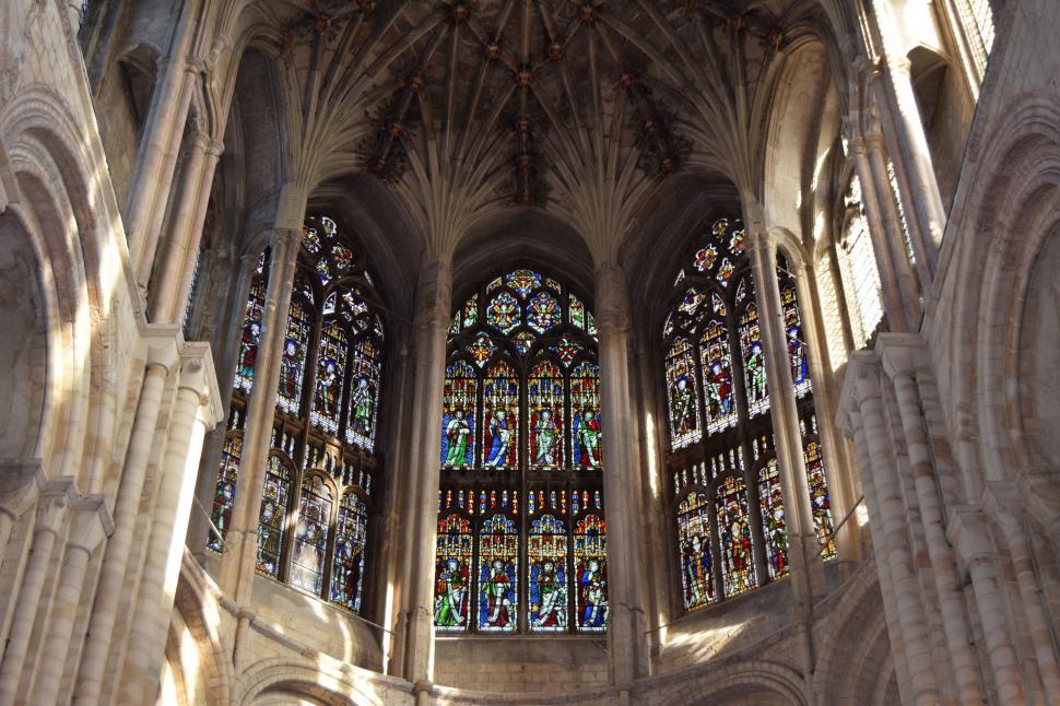 Free Image of The Interior of a Grand Cathedral With Stained Glass Windows 