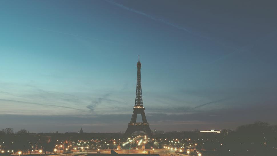 Free Image of The Eiffel Tower Illuminated at Night 