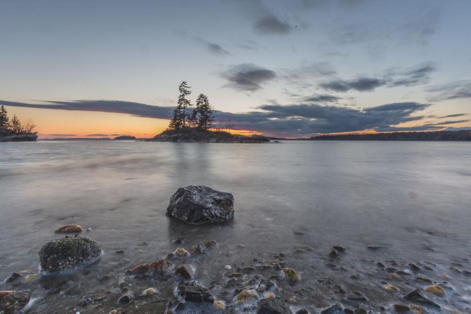 Free Image of Majestic Body of Water With Rocks 
