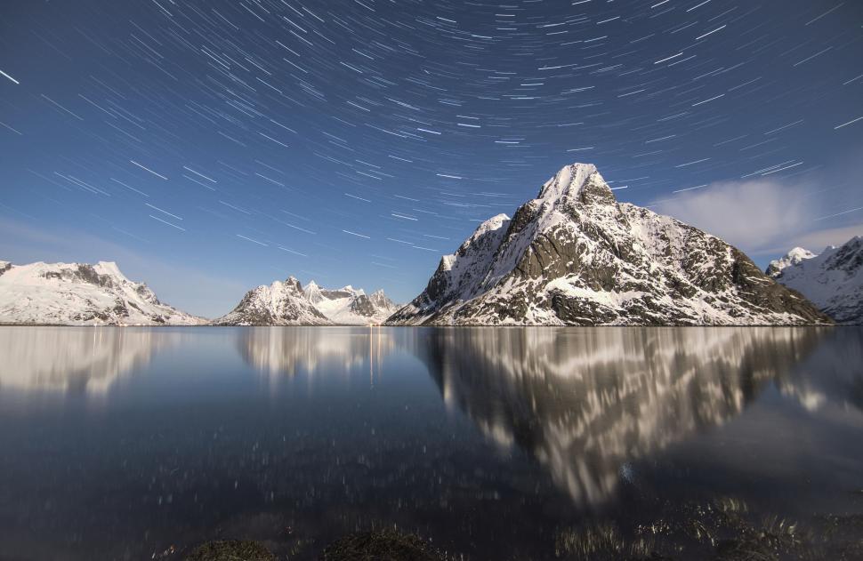 Free Image of Mountain Silhouetted With Star Trail 