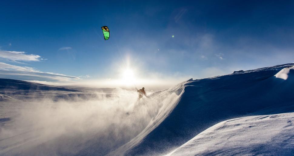 Free Image of Man Snowboarding Mid-Air 