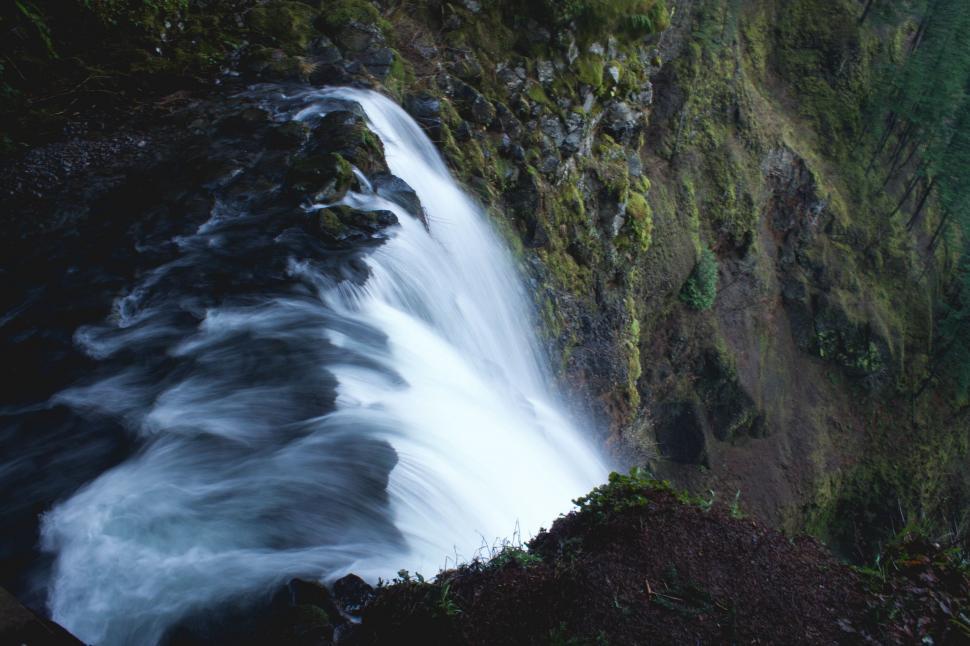Free Image of Majestic Waterfall Flowing Downward 
