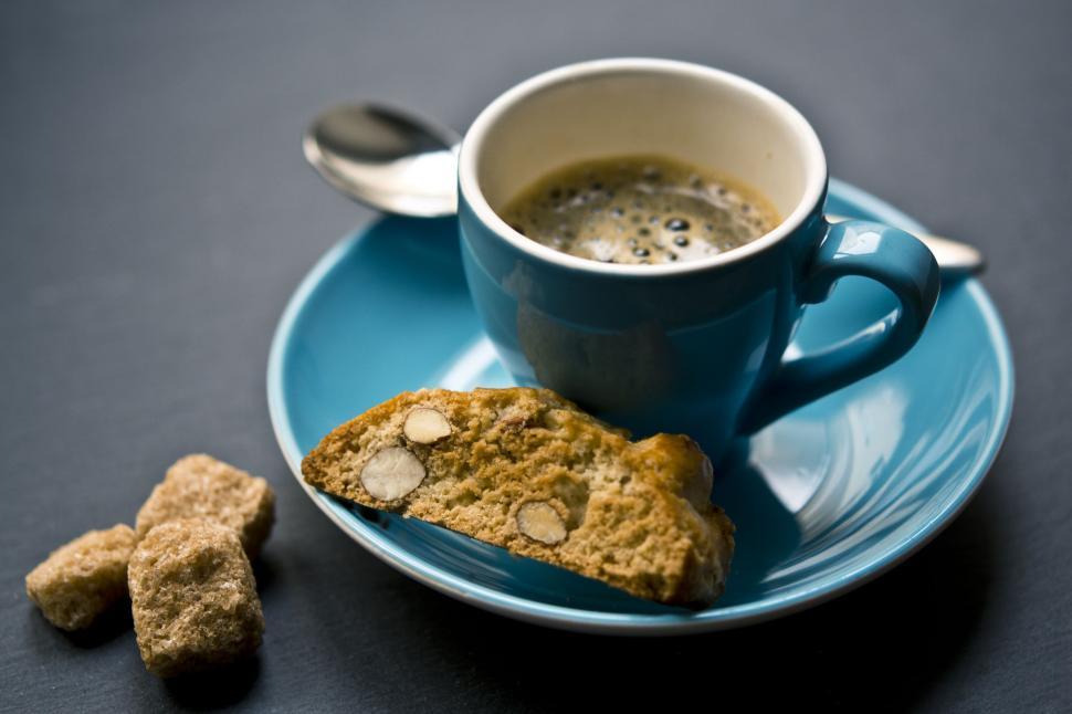Free Image of A Cup of Coffee and Some Cookies on a Blue Plate 