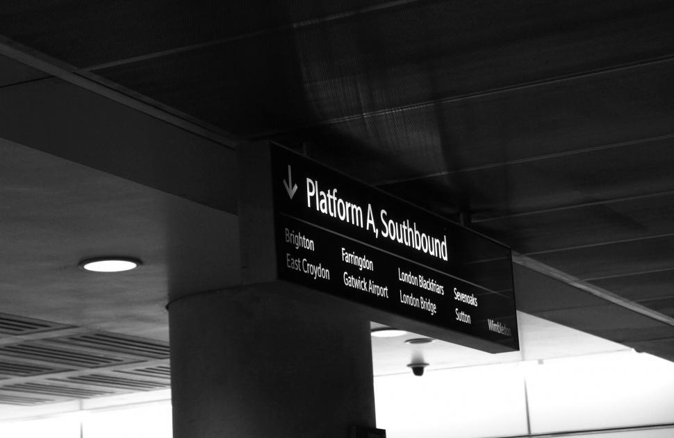 Free Image of Black and White Photo of Airport Sign 