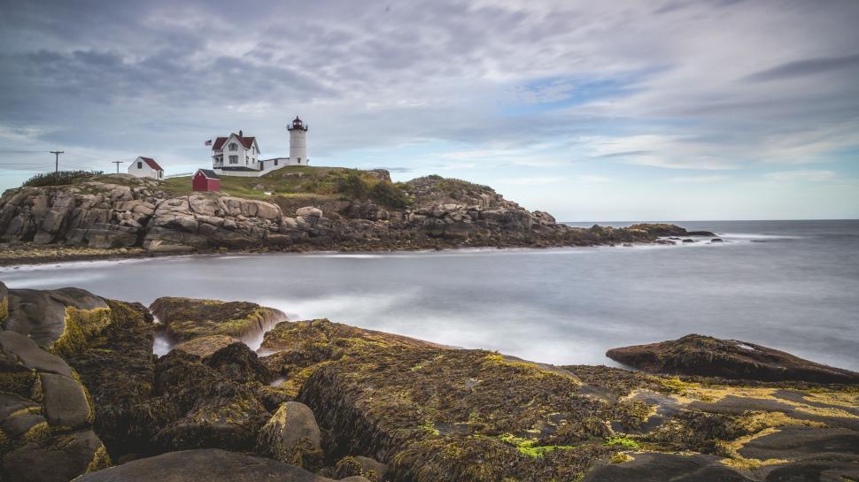 Free Image of Lighthouse on Rocky Shore 
