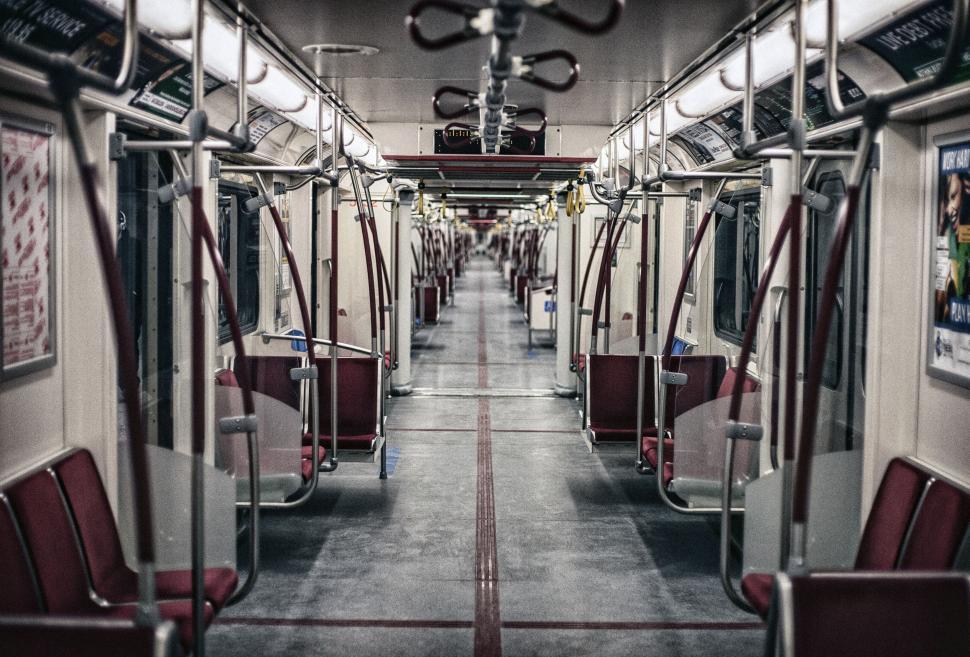Free Image of Train Car Filled With Red Seats 