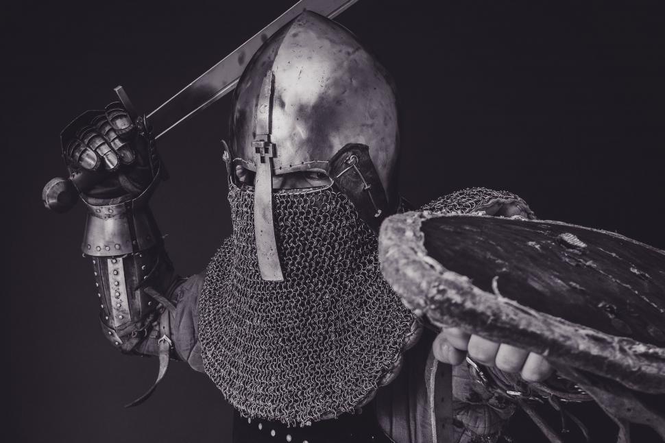 Free Image of A Knight With a Helmet and a Sword 