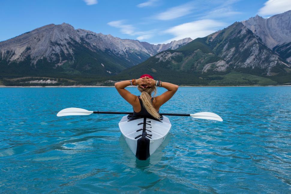 Free Image of Woman Sitting in Kayak on Lake 