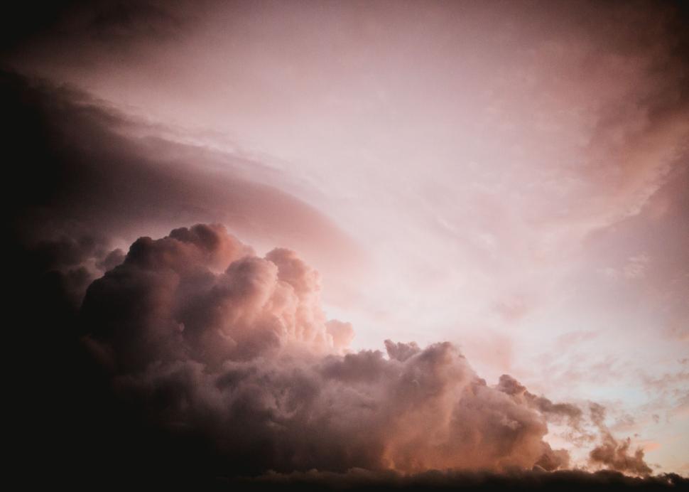Free Image of Large Dark Clouds Hovering in Night Sky 