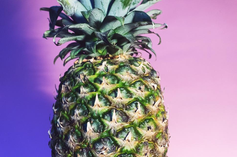 Free Image of Close Up of Pineapple on Purple Background 