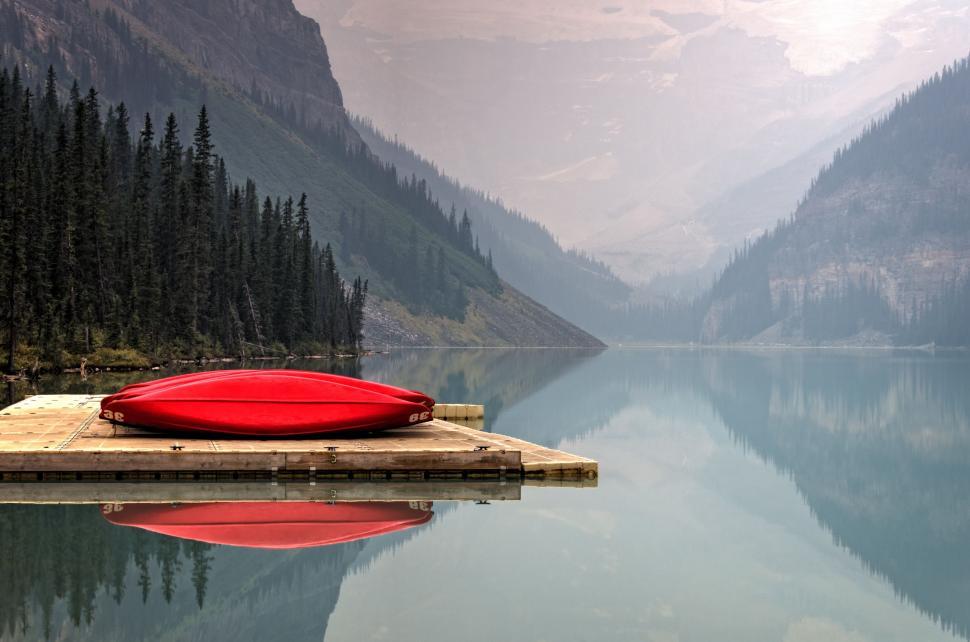 Free Image of Red Canoe on Dock by Mountain Lake 