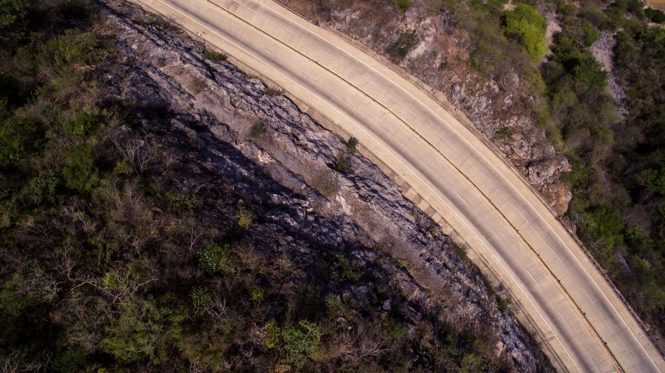 Free Image of Aerial View of a Road in the Mountains 
