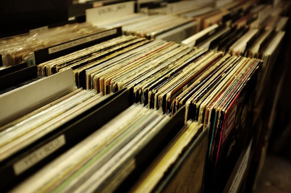 Free Image of Piles of Stacked Records in a Record Store 