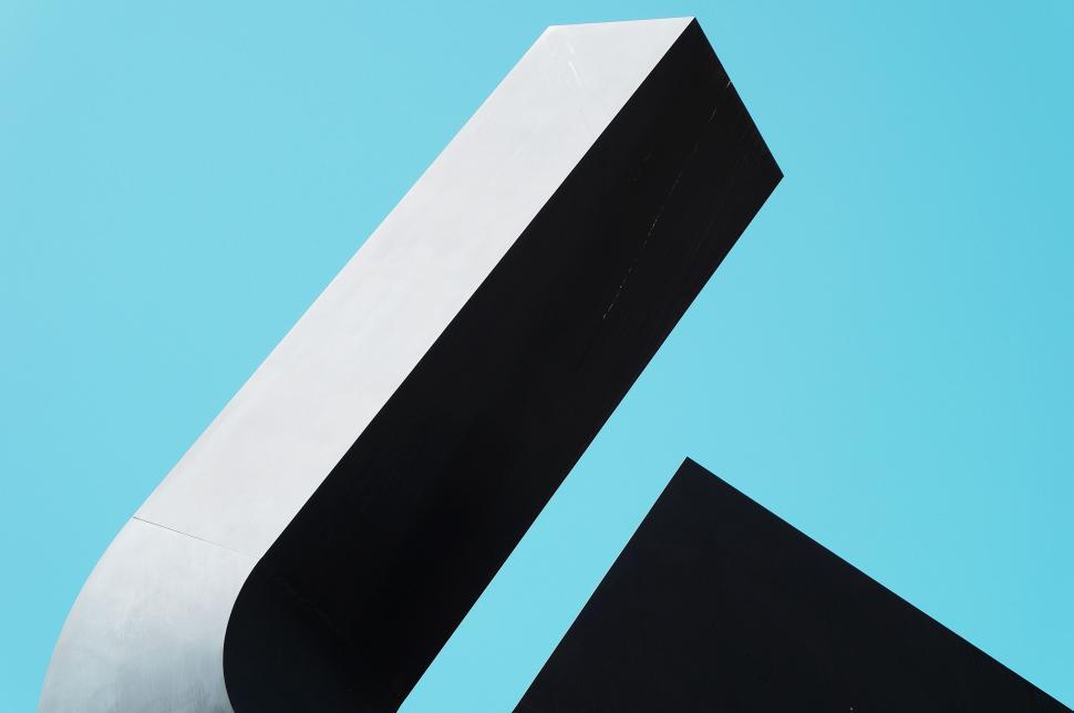 Free Image of Close Up of a Black and White Object on a Blue Background. 