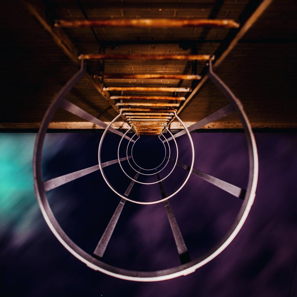 Free Image of Circular Metal Object Hanging From Ceiling 