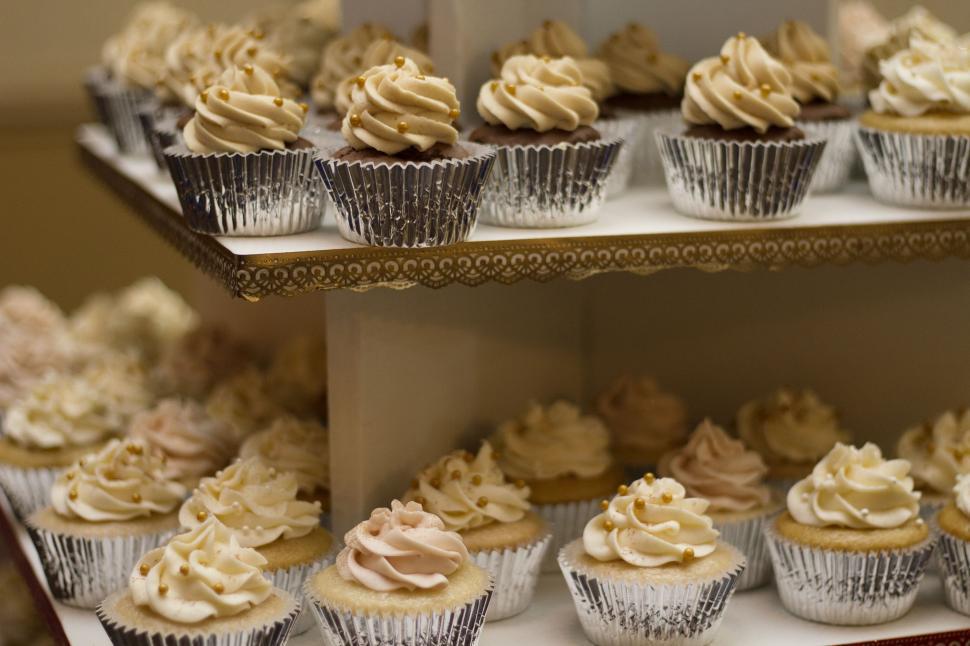 Free Image of Display of Cupcakes on a Shelf 