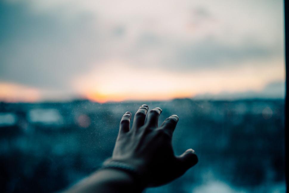 Free Image of Hand Reaching Out of Window 