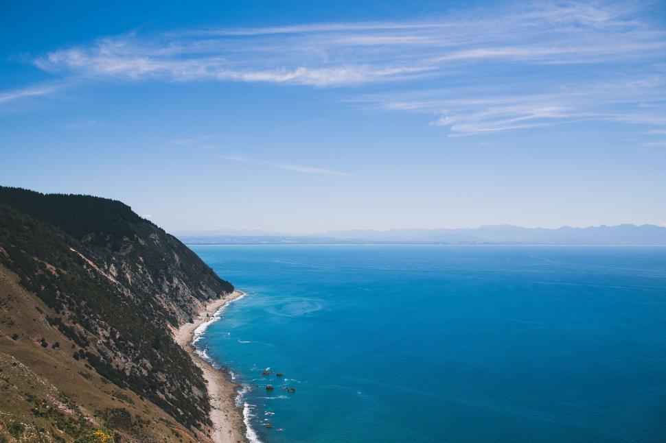 Free Image of Scenic View of the Ocean From a Hill 