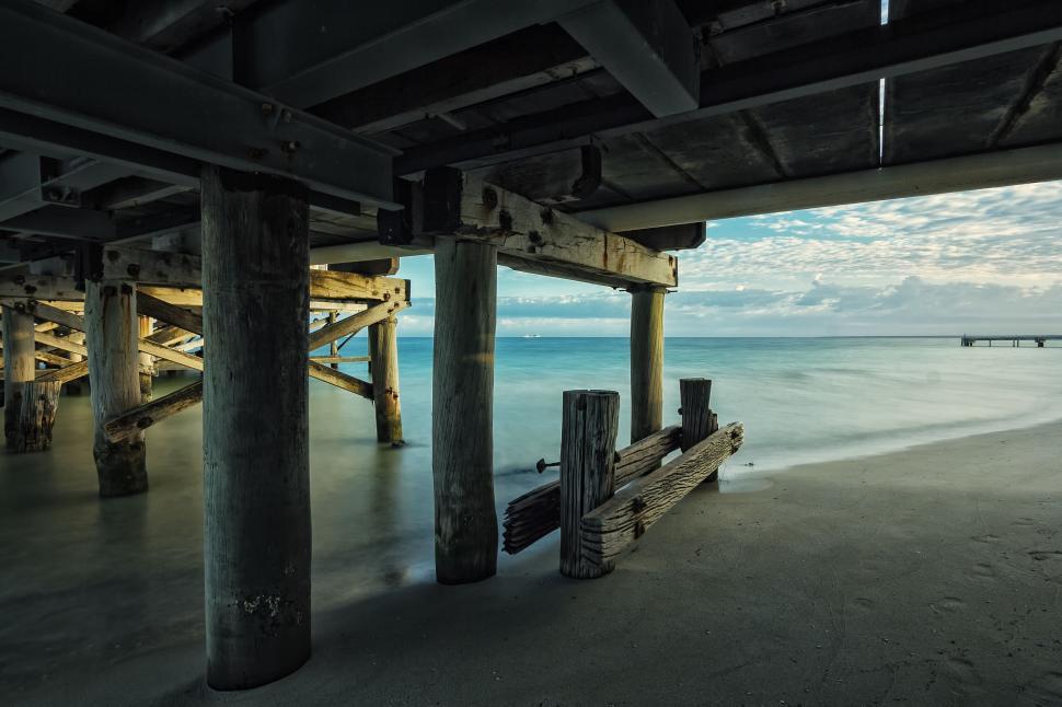 Free Image of Ocean View From Under a Pier 