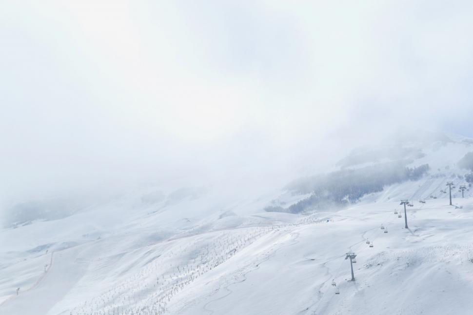 Free Image of Person Skiing on Snowy Mountain 