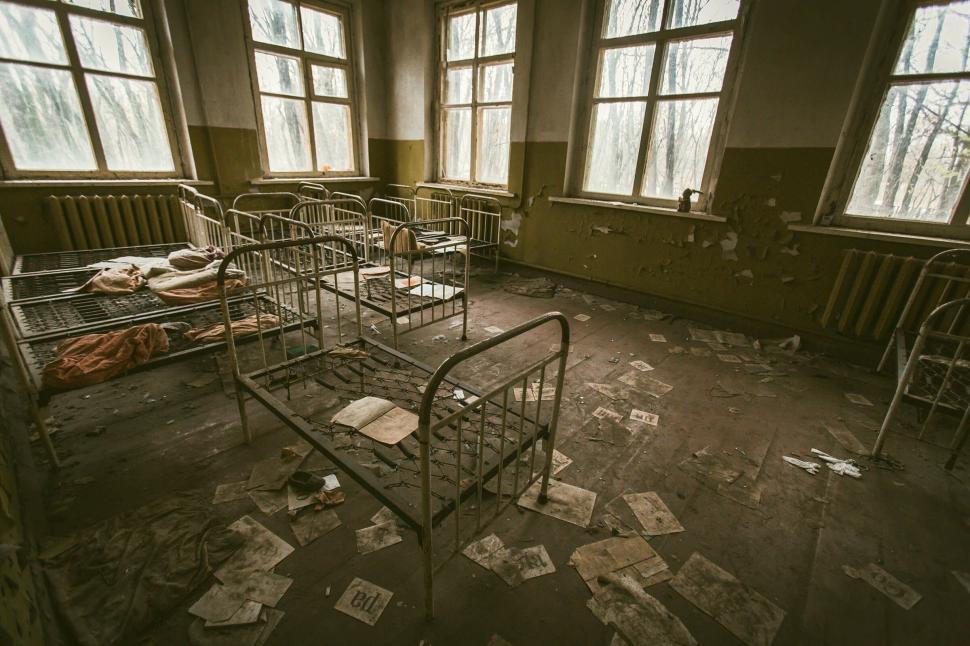 Free Image of Abandoned Hospital Room With Numerous Windows 