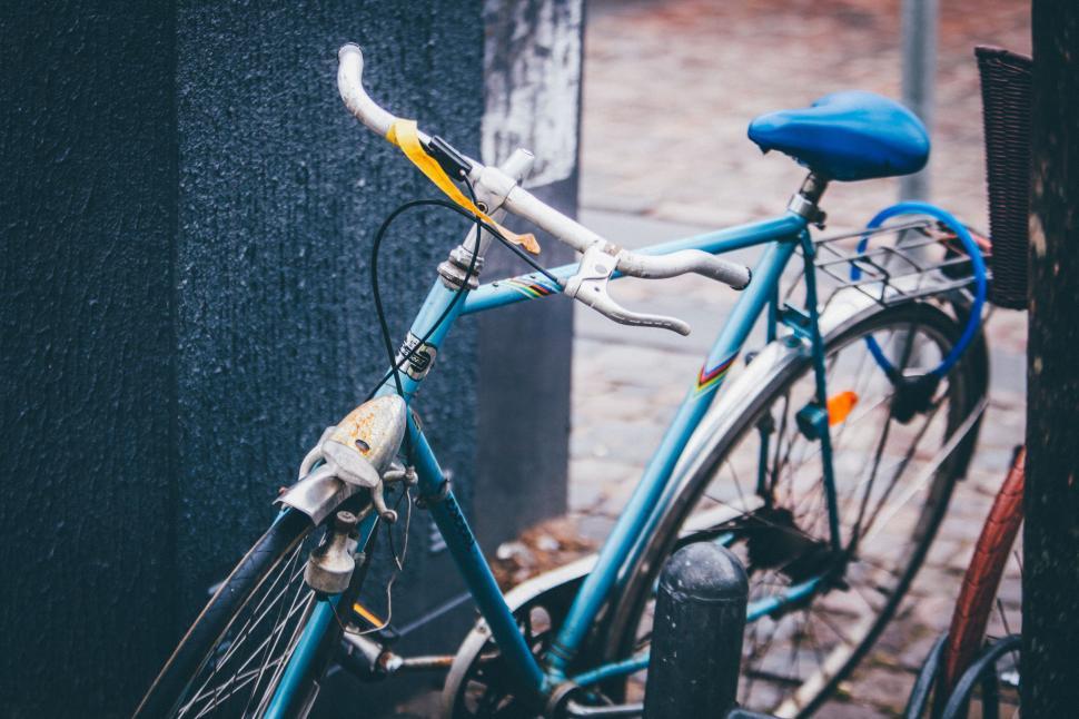 Free Image of Blue Bicycle Parked Next to Building 