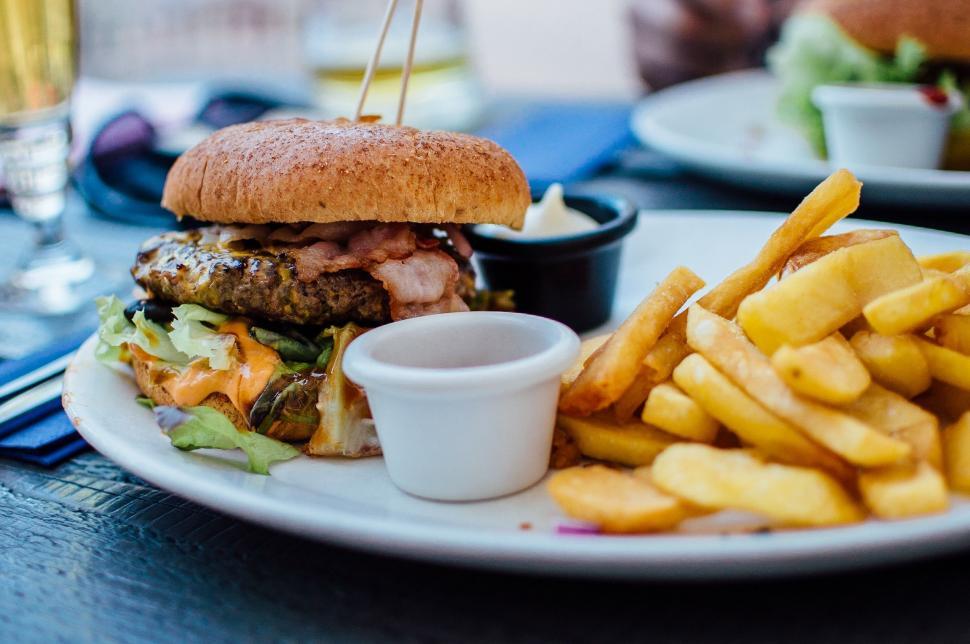 Free Image of Burger and Fries on Plate on Table 