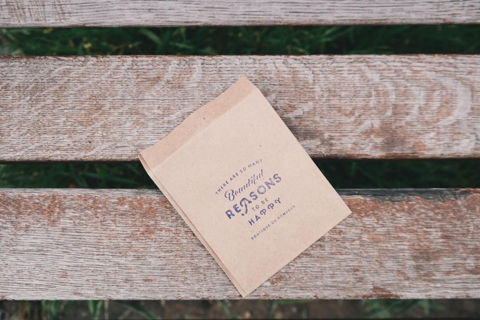 Free Image of Book Resting on Wooden Bench 