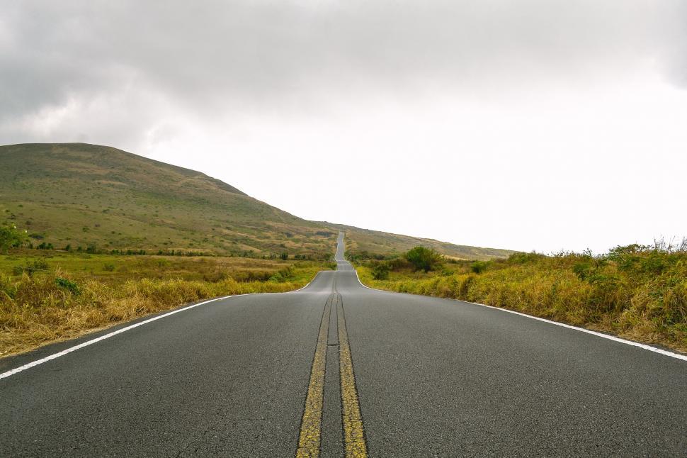 Free Image of Desolate Road Stretching Through Remote Landscape 