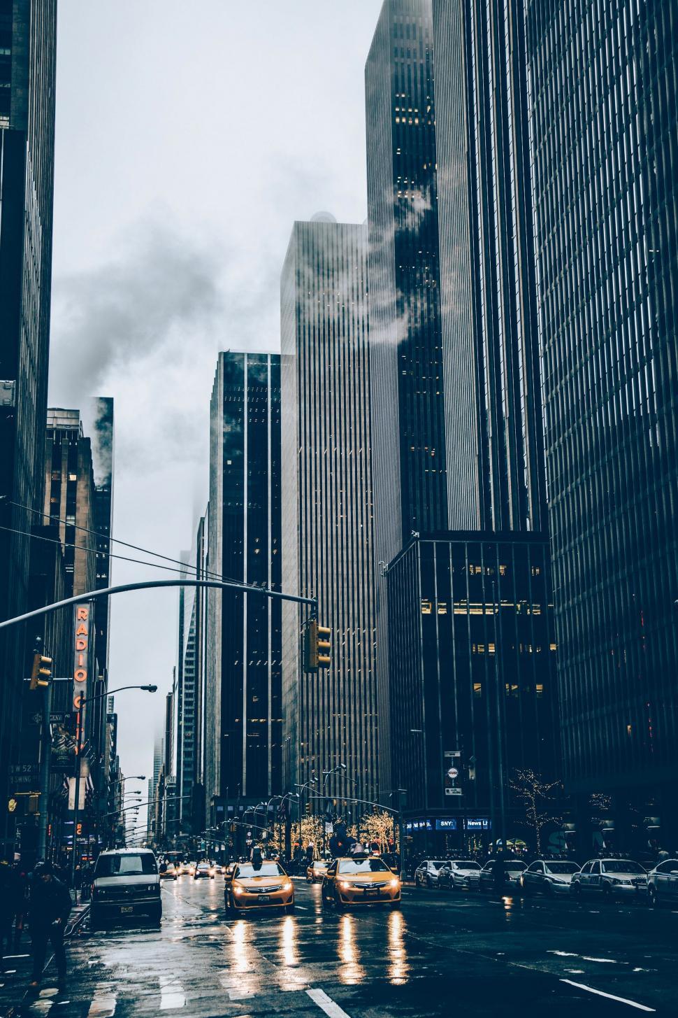 Free Image of Bustling City Street Filled With Tall Buildings 